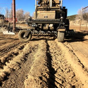 Modern reclamation machinery working the soil