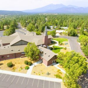 Property managment with well cared for grounds and mountains in the background